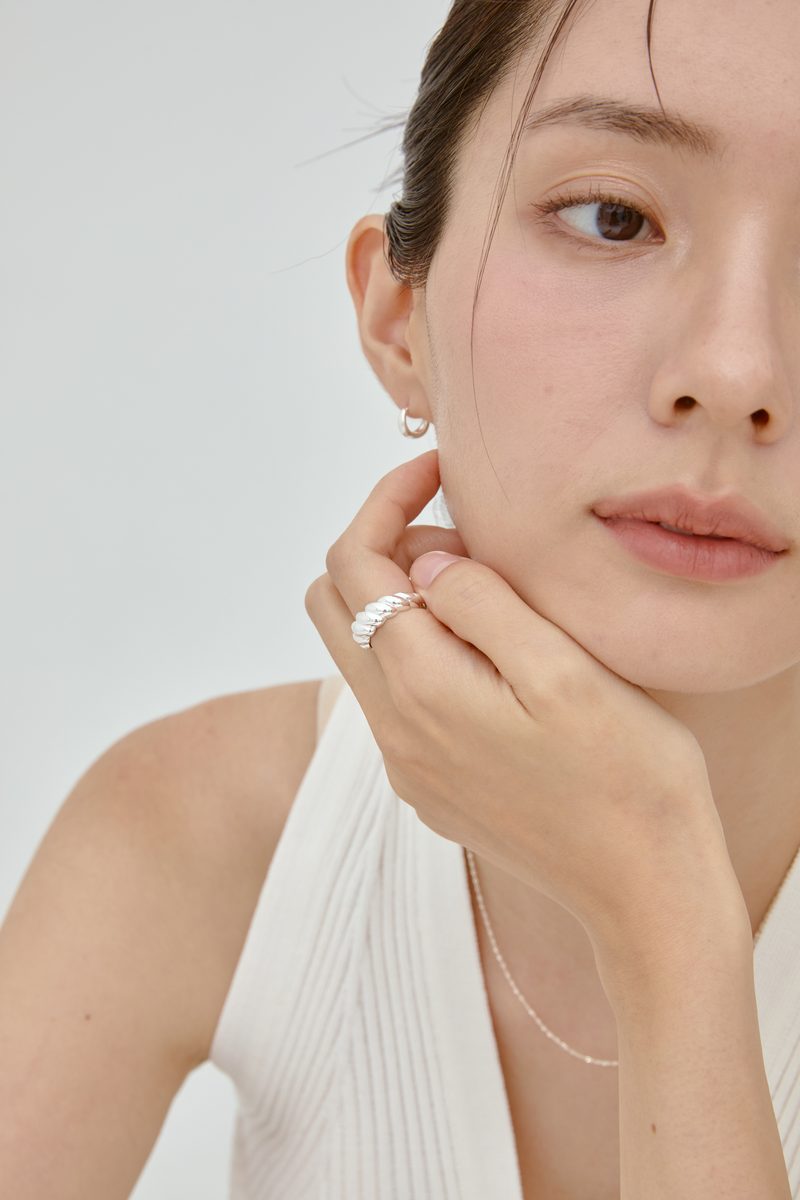 Silver croissant ring on model